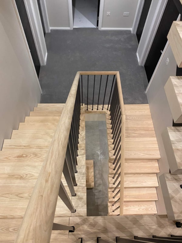 A cleaned stairway and hallway in a shared student house