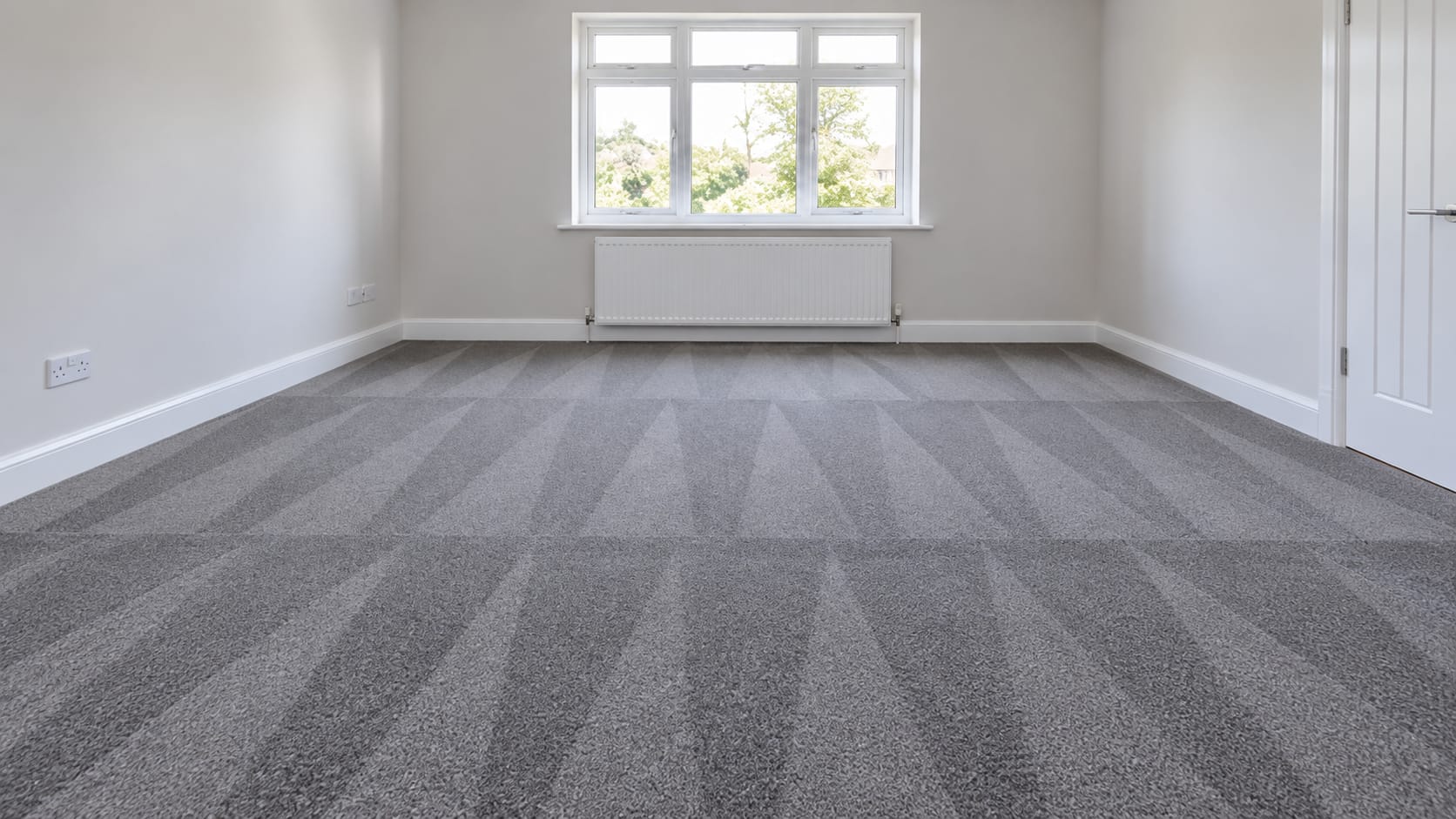 An empty room prepared for cleaning